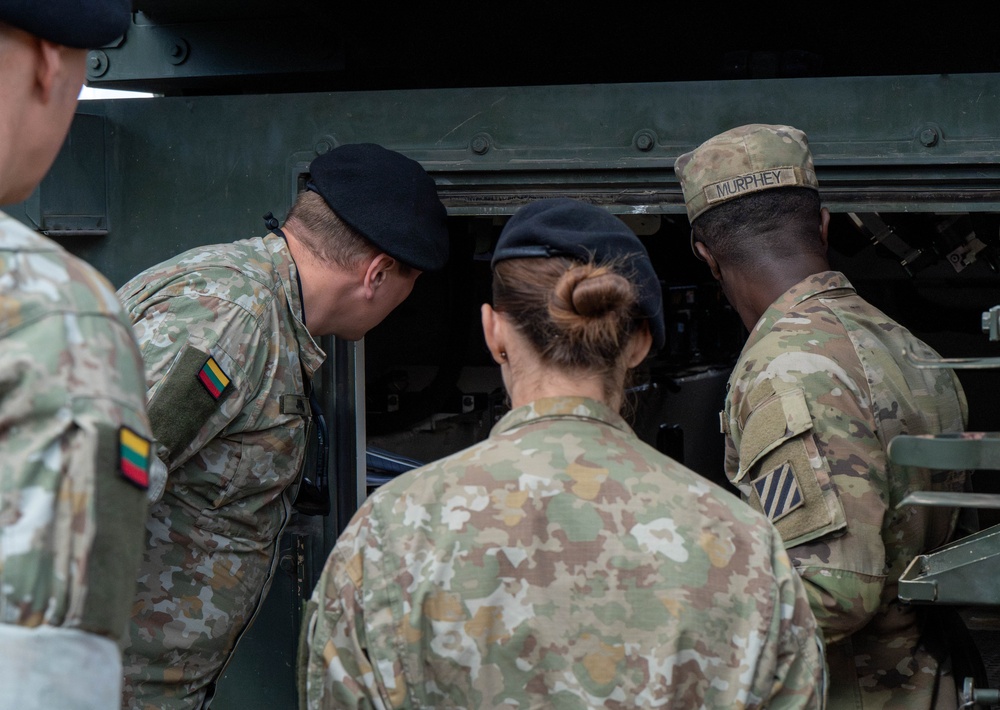 3rd Infantry Division Soldiers Conduct Preventative Maintenance Checks and Services With Lithuanian Army