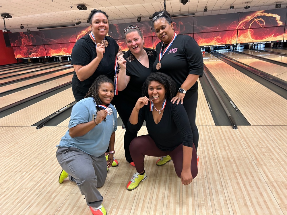 Title: DLA Energy builds connections through bowling during symposium