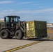 U.S. Marines with 3rd Bn., 4th Marines, move equipment and supplies during Arctic Edge 25