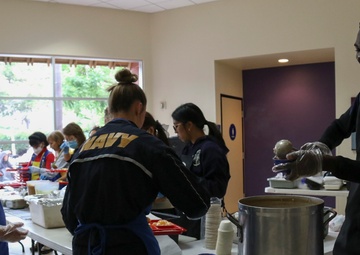 COMLCSRON One volunteers at Third Avenue Charitable Organization