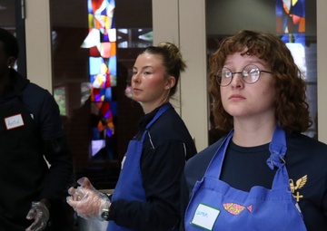 COMLCSRON One volunteers at Third Avenue Charitable Organization