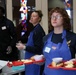 COMLCSRON One volunteers at Third Avenue Charitable Organization