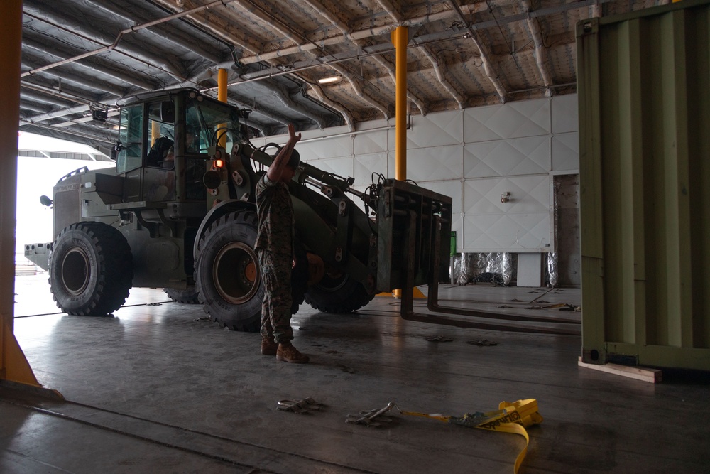 USNS Guam offloads equipment at MCAS Iwakuni