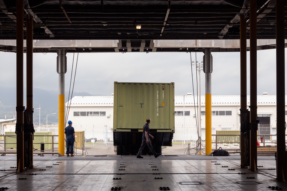USNS Guam offloads equipment at MCAS Iwakuni.