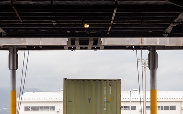 USNS Guam offloads equipment at MCAS Iwakuni.