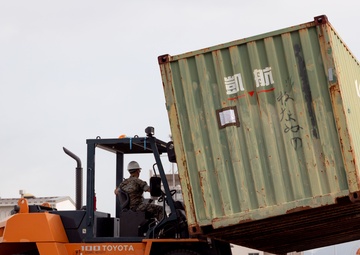 USNS Guam offloads equipment at MCAS Iwakuni