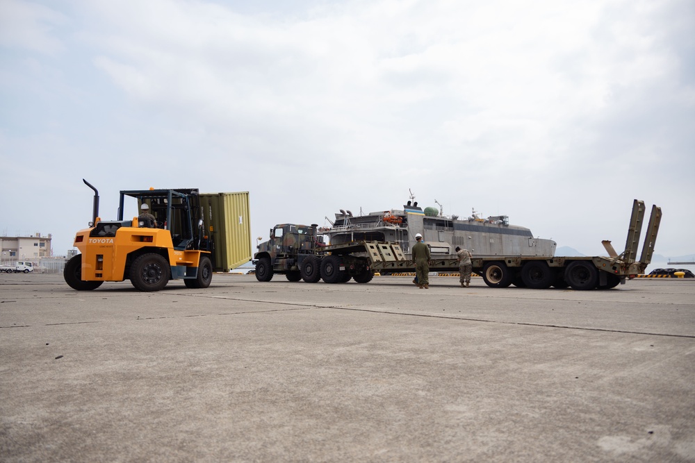 USNS Guam offloads equipment at MCAS Iwakuni