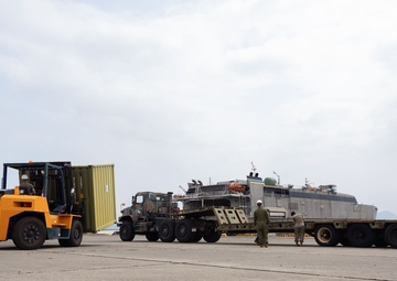 USNS Guam offloads equipment at MCAS Iwakuni