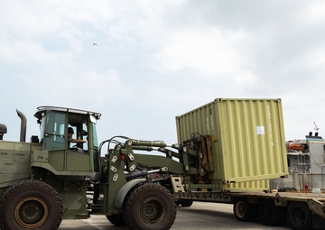 USNS Guam offloads equipment at MCAS Iwakuni