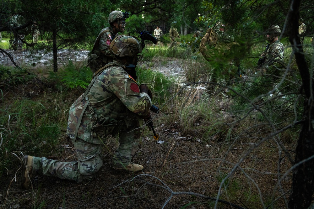 1-114th Conducts Special School Assessment