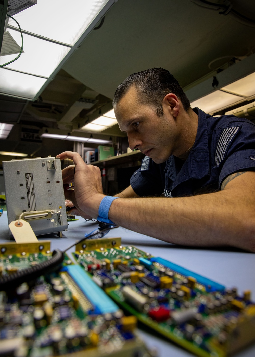 USS Gerald R. Ford (CVN 78) Sailor Conducts Maintenance