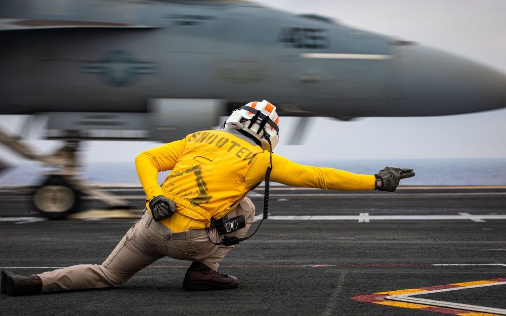 USS Gerald R. Ford (CVN 78) Sailor Launches Jet