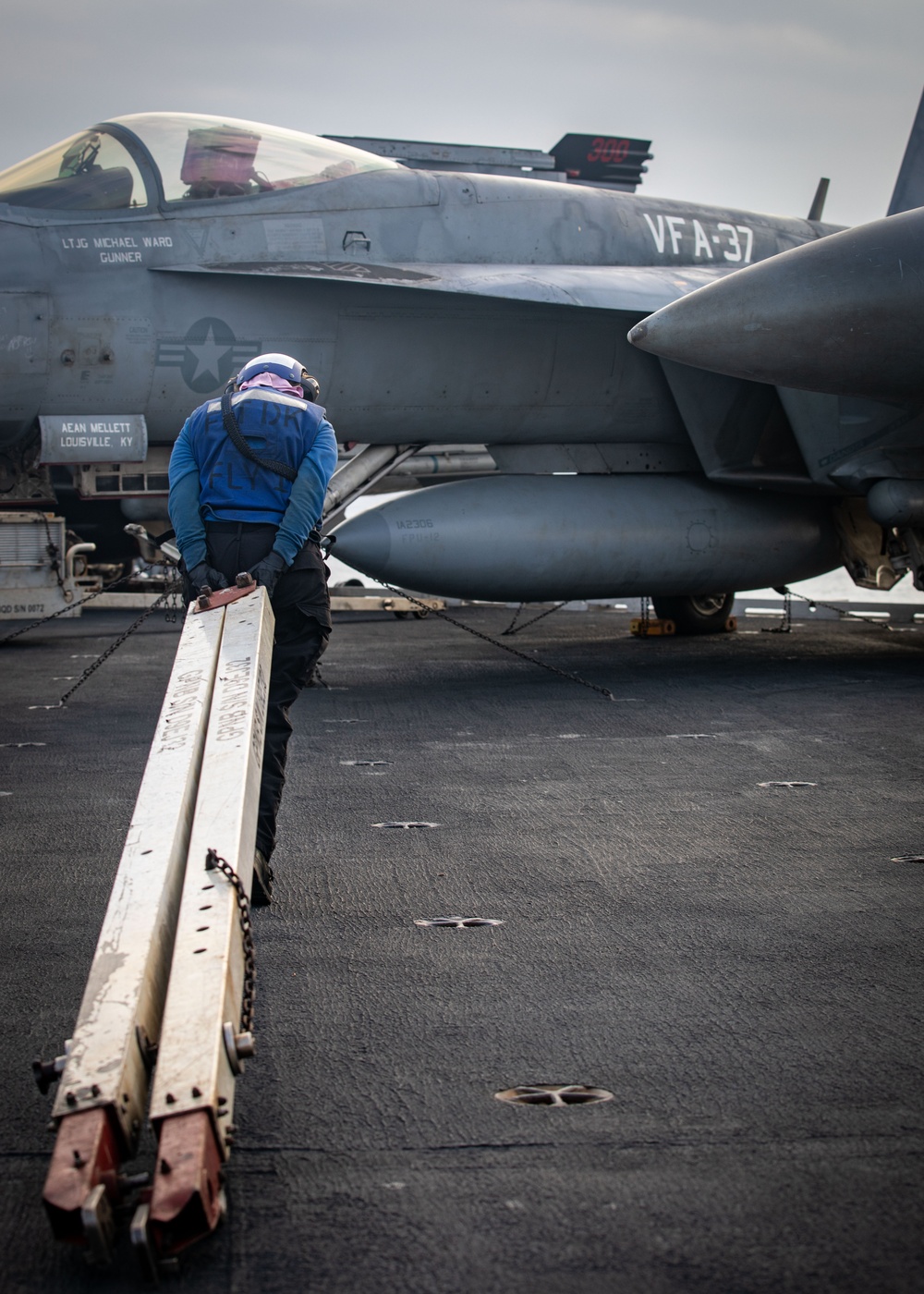 USS Gerald R. Ford (CVN 78) Sailor Moves A Towbar