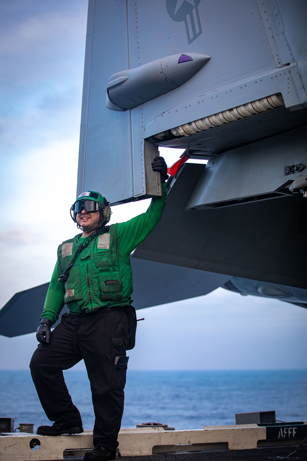 Strike Fighter Squadron 37 Sailor Observes Flight Operations