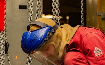 USS Gerald R. Ford (CVN 78) Sailor Conducts Maintenance