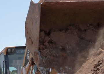 Repairing a slide: Tulsa District Red River Area offices use lime, heavy machinery for dam safety repair