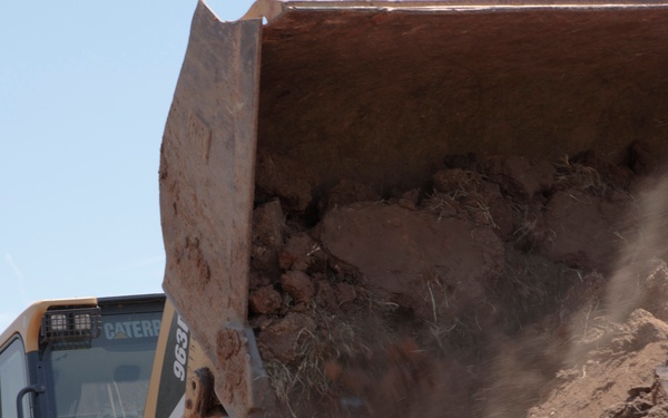 Repairing a slide: Tulsa District Red River Area offices use lime, heavy machinery for dam safety repair