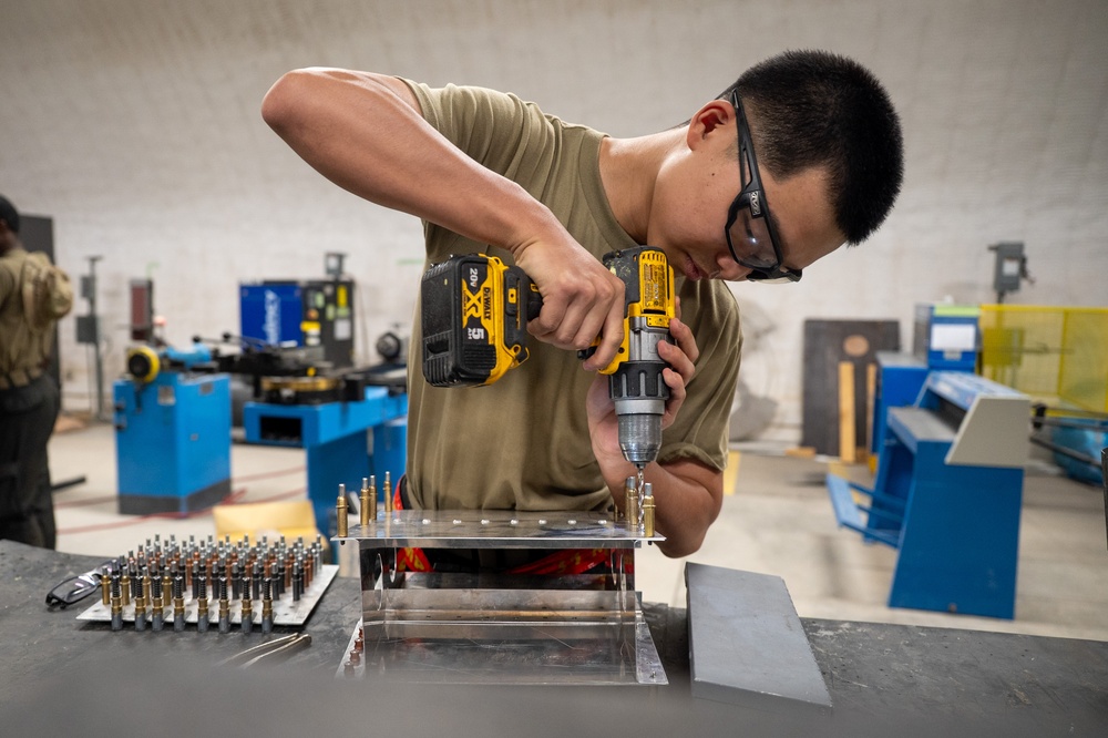 Forging the Fight: 378th EMXS fabrication flight maintains laser-focused precision