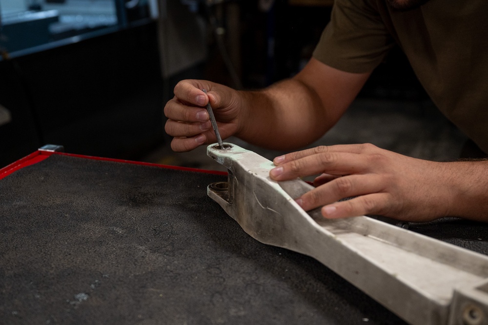Forging the Fight: 378th EMXS fabrication flight maintains laser-focused precision