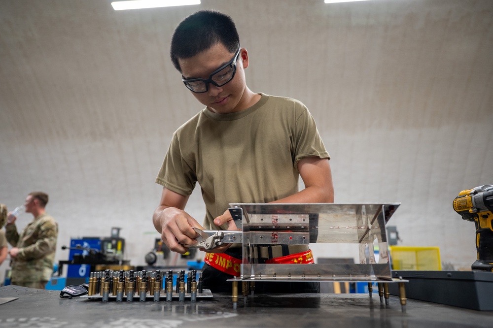Forging the Fight: 378th EMXS fabrication flight maintains laser-focused precision