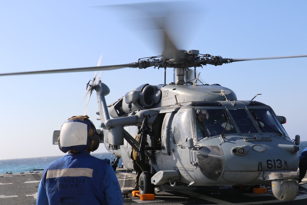 Mustin conducts routine operations