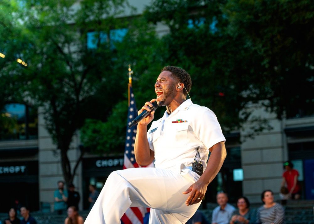 Navy Band performs at the Navy Memorial Plaza