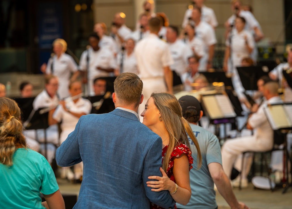 Navy Band performs at the Navy Memorial Plaza