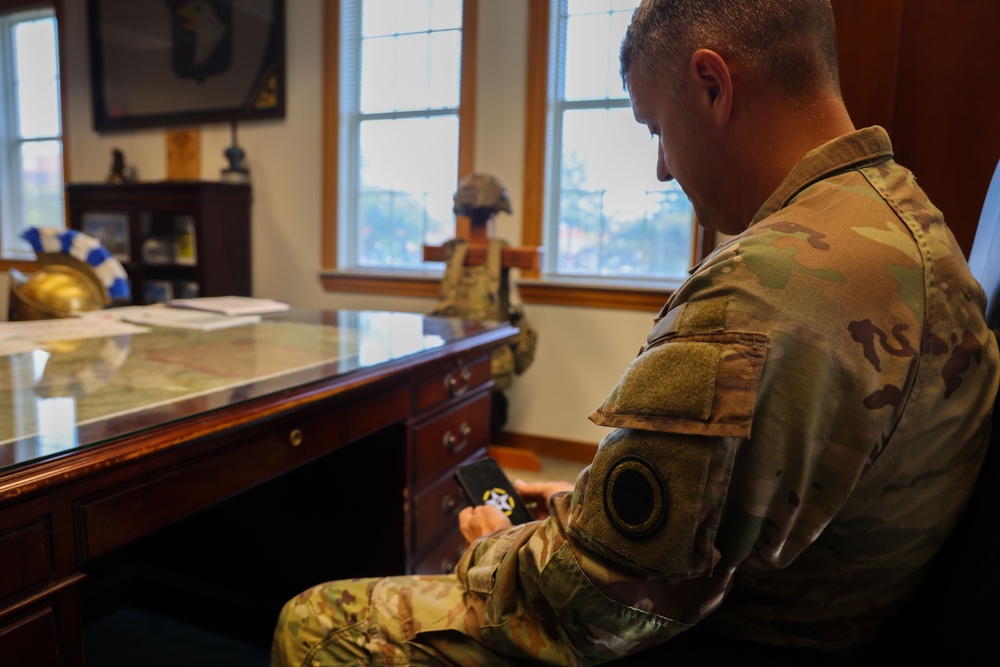 Command Sgt. Maj. Jonathan Reffeor browses the My Army Post app