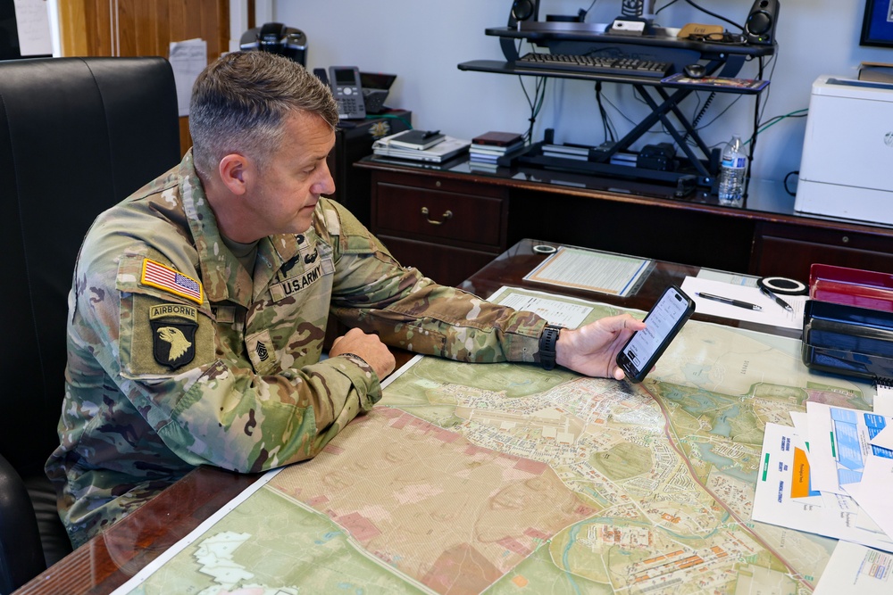 Command Sgt. Maj. Jonathan Reffeor browses the My Army Post app