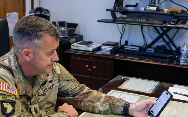 Command Sgt. Maj. Jonathan Reffeor browses the My Army Post app