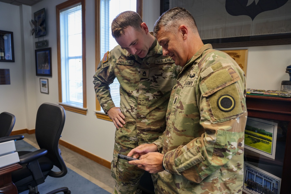 Command Sgt. Maj. Jonathan Reffeor browses the My Army Post app