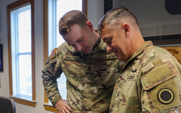 Command Sgt. Maj. Jonathan Reffeor browses the My Army Post app