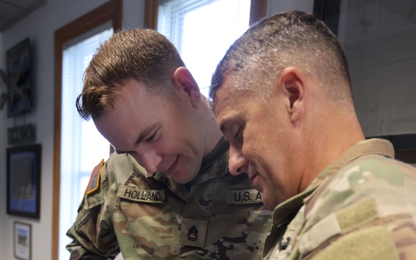 Command Sgt. Maj. Jonathan Reffeor browses the My Army Post app