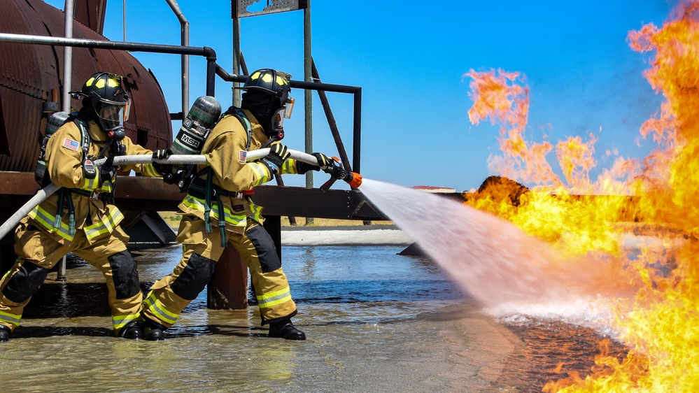 Travis AFB firefighters perform live-fire training