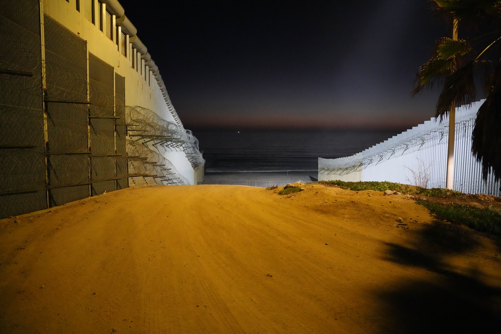 CBP Commissioner Rodney S. Scott tours the U.S. – Mexico border wall near San Diego