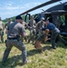 Maryland Army National Guardsmen engage with police K-9s during flight familiarization