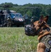 Maryland Army National Guardsmen engage with police K-9s during flight familiarization