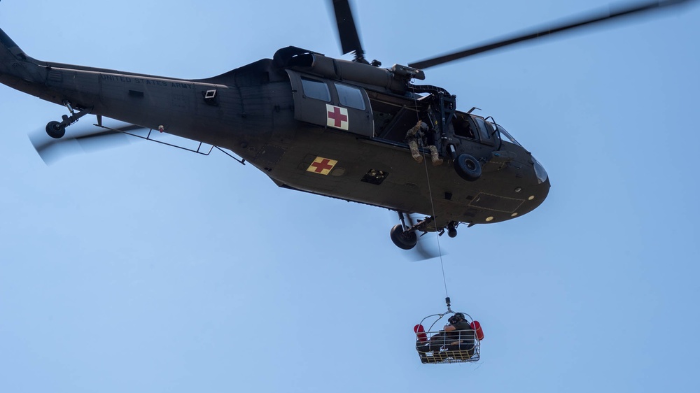 Maryland Army National Guardsmen engage with police K-9s during flight familiarization