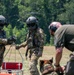 Maryland Army National Guardsmen engage with police K-9s during flight familiarization