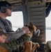 Maryland Army National Guardsmen engage with police K-9s during flight familiarization