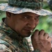 Panamanian and USMC members learn about flora and fauna during jungle survival course