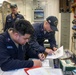 Frank E. Petersen Jr. conducts damage control exercise