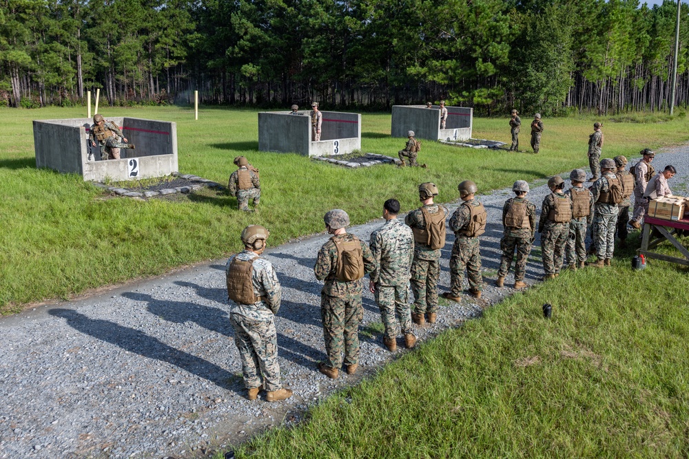 Marines with School of Infantry - East train to throw grenades