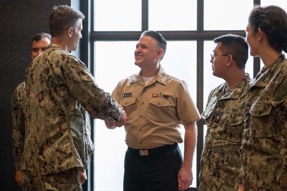 Capt. Robert &amp;quot;Seph&amp;quot; Coats leads reenlistment ceremony in the U.S. Navy Band's historic vestibule