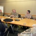 USUHS President talks with Tri-Service Dental Researchers
