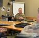 USUHS President talks with Tri-Service Dental Researchers