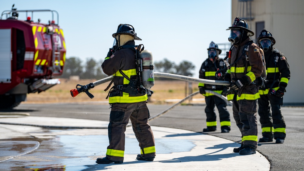 Team Travis partners with SFO firefighters in live-fire training