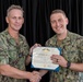 Sailor Accepts Award