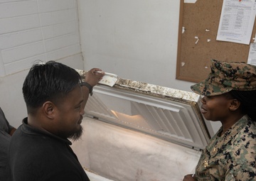 Koa Moana 25 Sailors Conduct Food Inspection