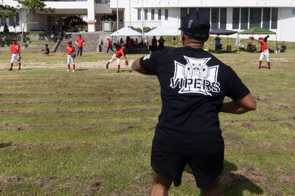 HMLA-169 Marines play baseball with local youth baseball team